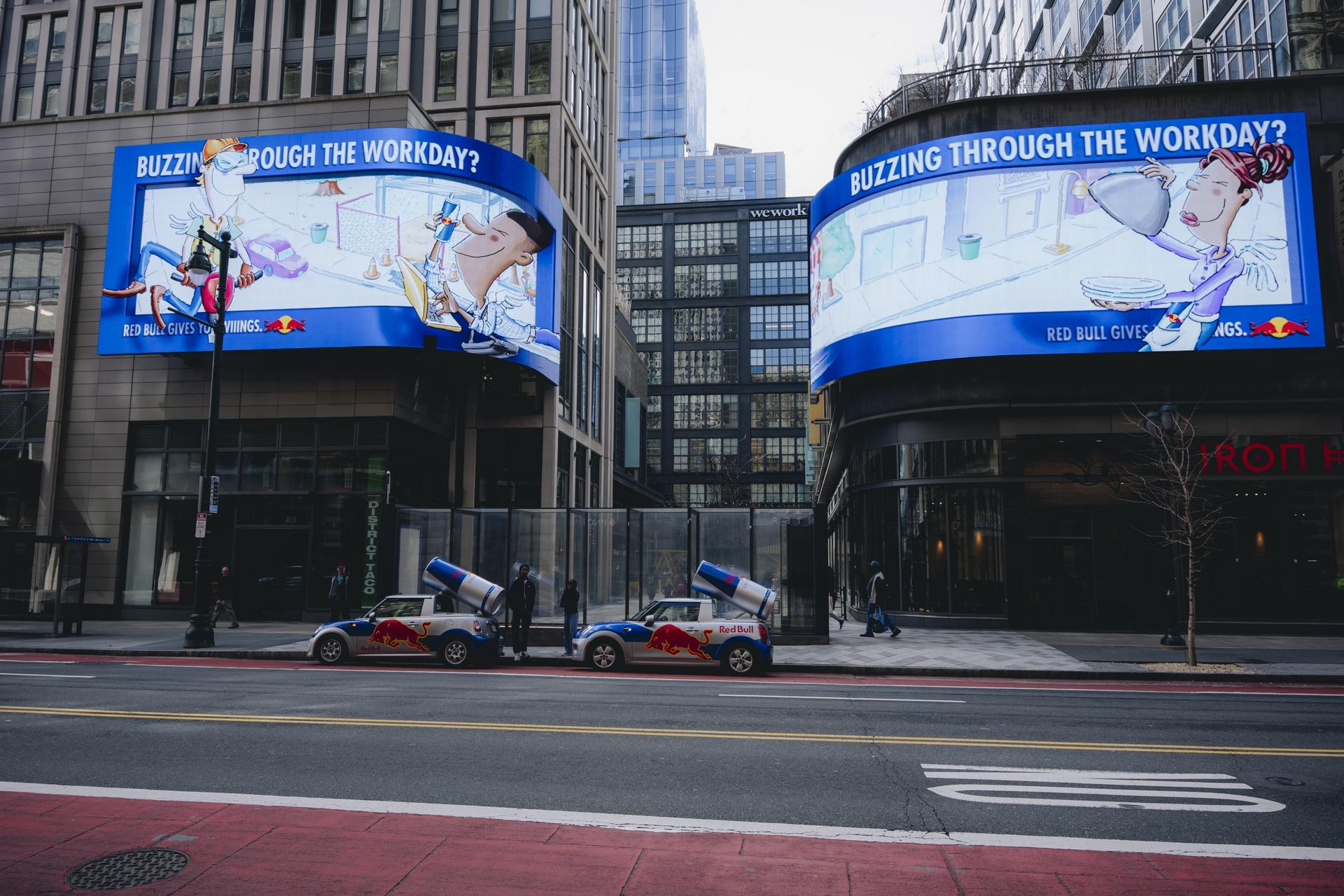 Buzzing Through the Workday? — Twin curved digital billboards, Center City Philadelphia